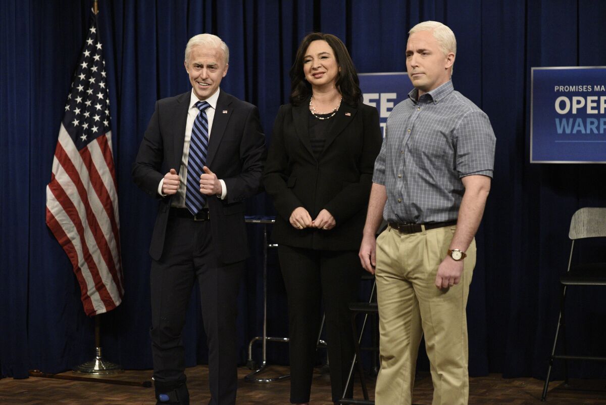Alex Moffat as Joe Biden, from left, Maya Rudolph as Kamala Harris and Beck Bennett as Mike Pence on "Saturday Night Live."