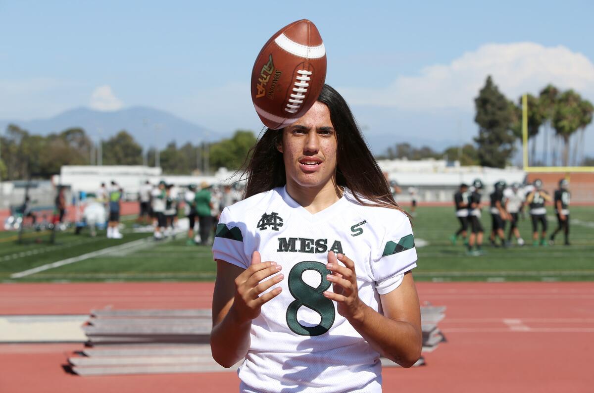 Costa Mesa junior quarterback Nick Burton completed 11 of 19 passes for 118 yards and a touchdown, and rushed 10 times for 72 yards and a score against Santiago on Aug. 30.