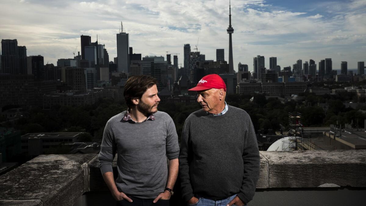 Actor Daniel Bruhl, left, with Niki Lauda, who he portrayed in Ron Howard's film, "Rush," in Toronto