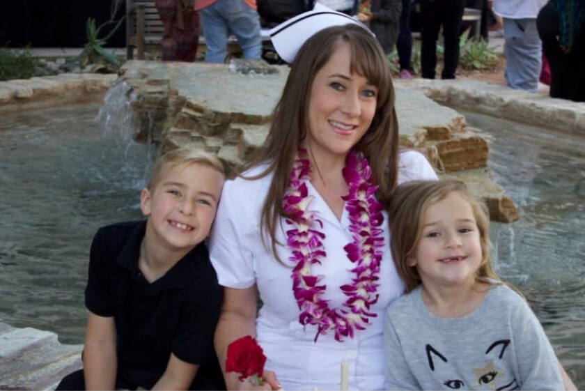 Cassandra Bravo, 34, of Riverside, with her children.
