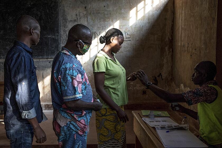People cast their votes Sunday at a polling station in Bangui, Central African Republic.