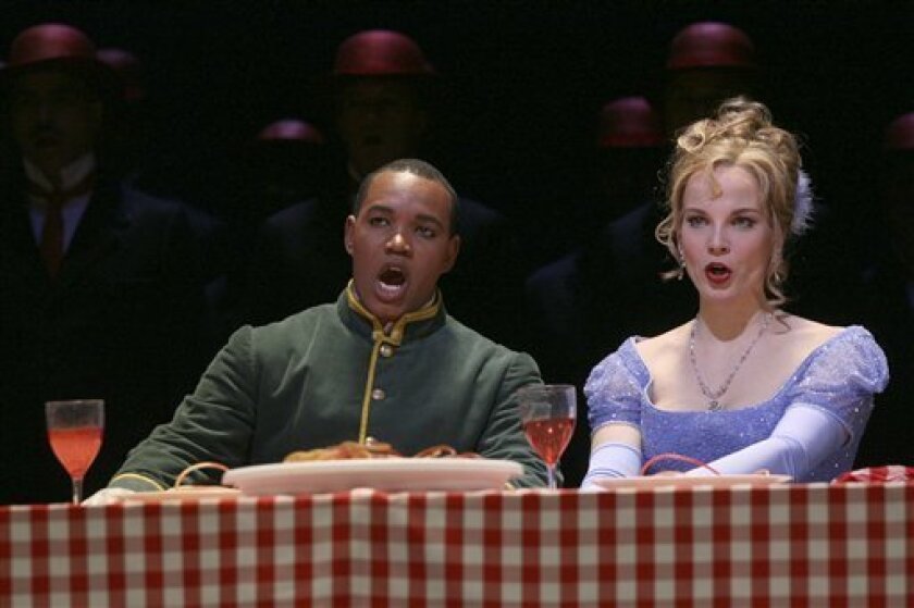 Elina Garanca, right, performs as Angelina alongside Lawrence Brownlee, performing as Don Ramiro during the final dress rehearsal of Gioachino Rossini's "La Cenerentola" ("Cinderella") Wednesday, April 29, 2009 at the Metropolitan Opera in New York. (AP Photo/Mary Altaffer)