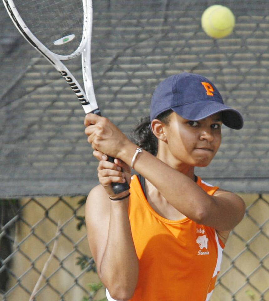 Pasadena Poly's Aria Griffin hits the ball during a match against Flintridge Prep at Scholl Canyon Tennis Center in Glendale on Friday, September 21, 2012.