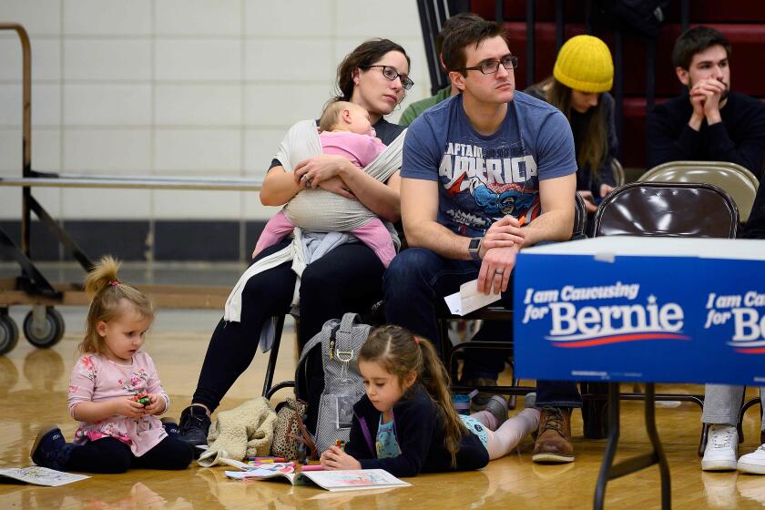 Supporters of Democratic Presidential Candidate Vermont Senator Bernie Sanders wait to be counted at their precinct at Abraham Lincoln High School in Des Moines, Iowa, on February 3, 2020. (Photo by JIM WATSON / AFP) (Photo by JIM WATSON/AFP via Getty Images) ** OUTS - ELSENT, FPG, CM - OUTS * NM, PH, VA if sourced by CT, LA or MoD **