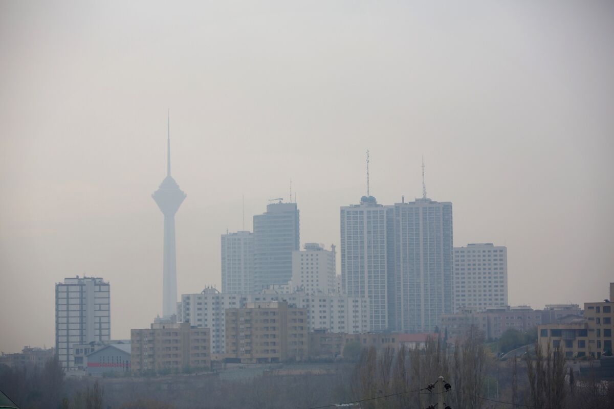 Smog in Tehran engulfs the Milad telecommunication tower and other buildings last year. The Iranian capital has coped with a particularly bad siege of pollution in recent days.
