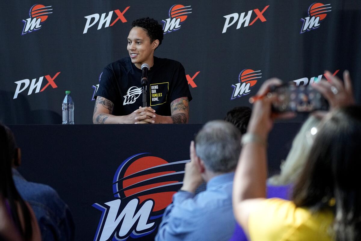 WNBA basketball player Brittney Griner speaks at a news conference.