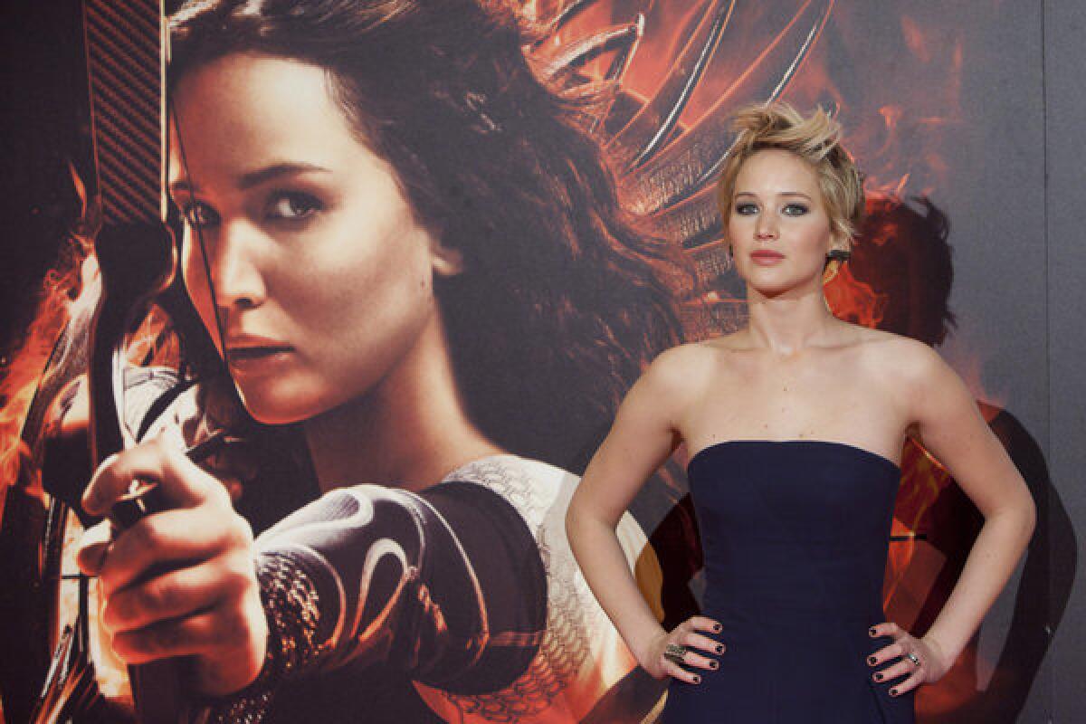 Jennifer Lawrence poses for photographers during the Spanish premiere of the movie "The Hunger Games: Catching Fire."