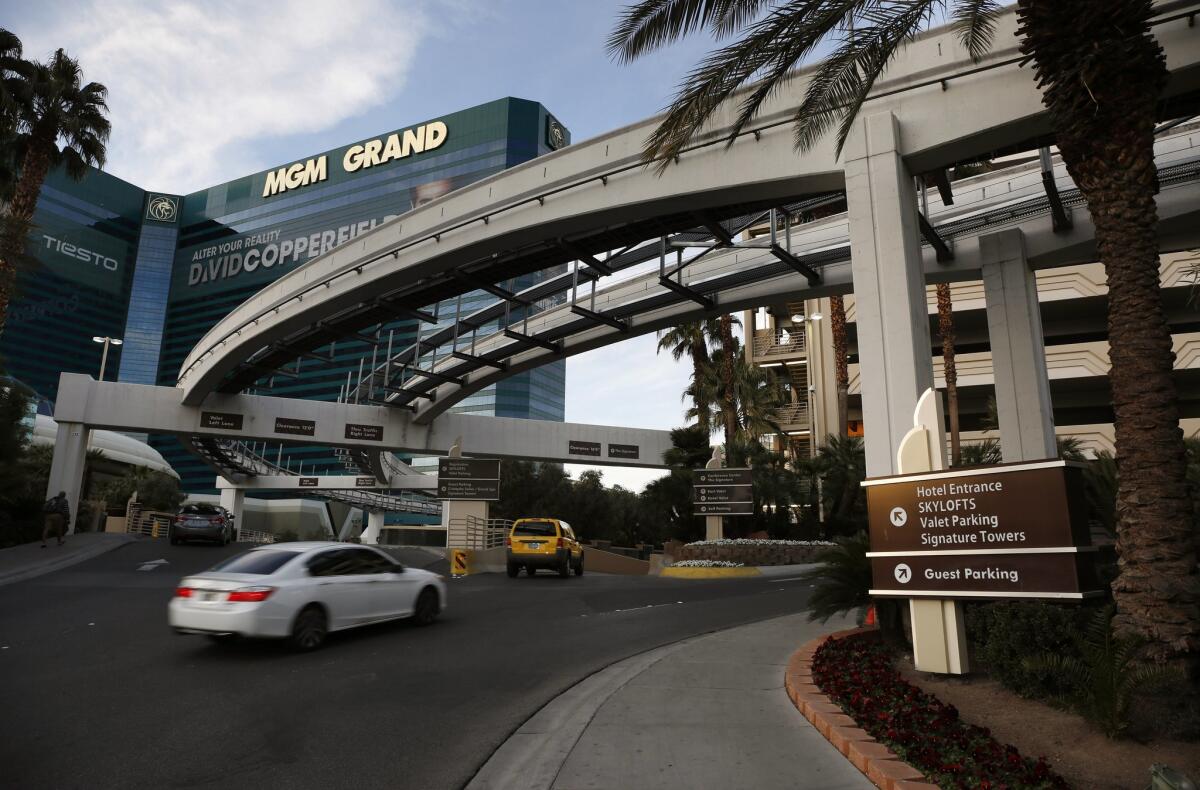 Cars drive into the MGM Grand hotel and casino in Las Vegas on Jan. 14. MGM Resorts International announced that it plans to begin charging visitors for parking this year at some of its properties in the city.