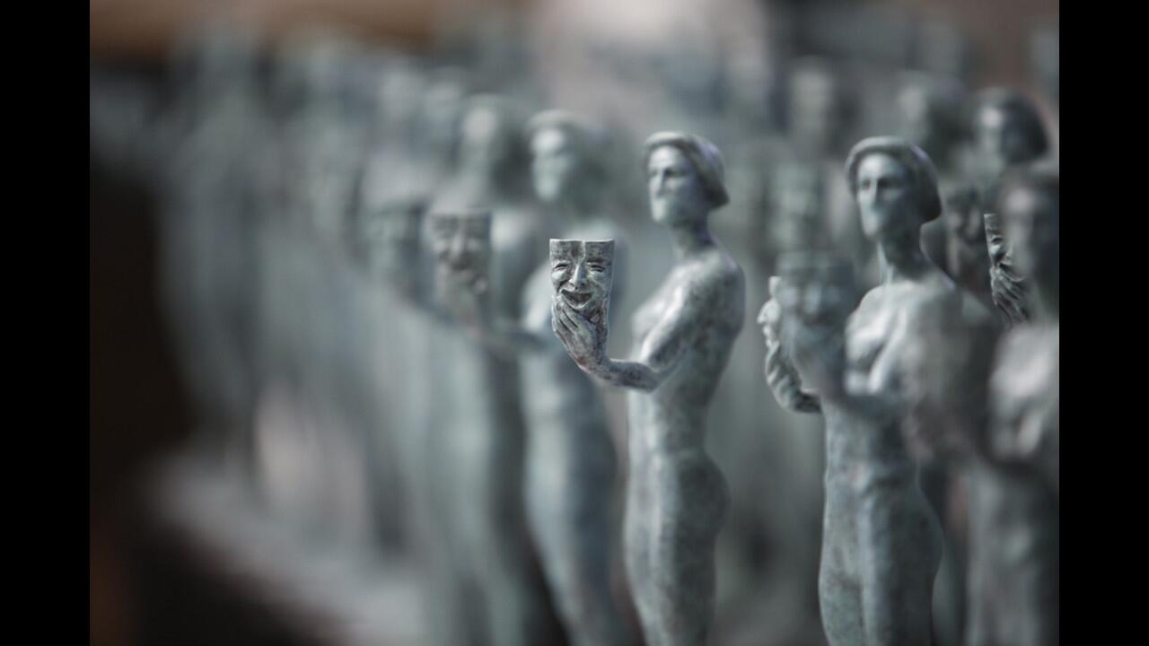 Solid bronze Actor statuettes for the SAG Awards are lined up after they are cast from molten bronze metal at American Fine Arts Foundry in Burbank.