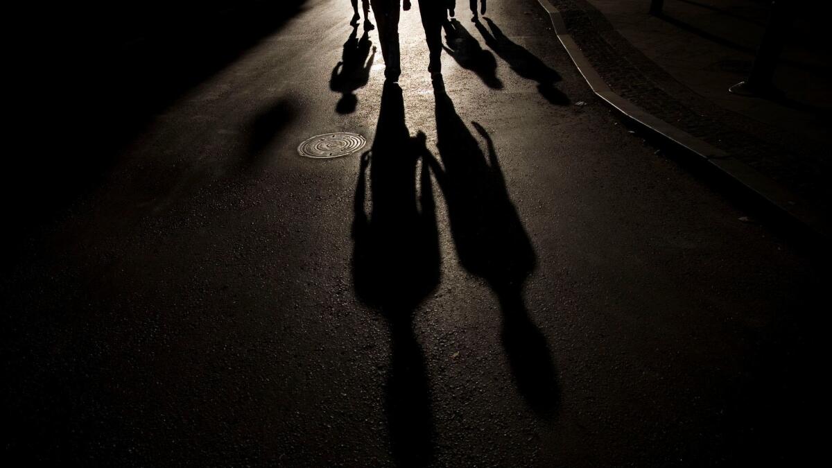 Israelis walk in the middle of an empty street on Yom Kippur in Jerusalem on Oct. 9, 2008. Yom Kippur is the holiest of Jewish holidays when observant Jews atone for the sins of the past year.