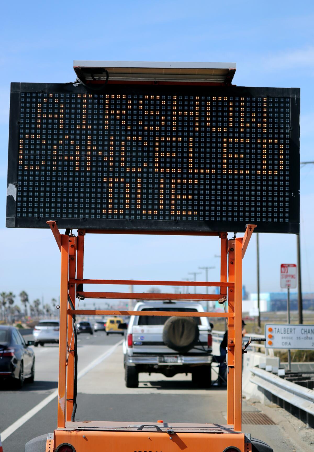 A sign announces to drivers the Pacific Air Show had been canceled Sunday due to  the major oil spill.