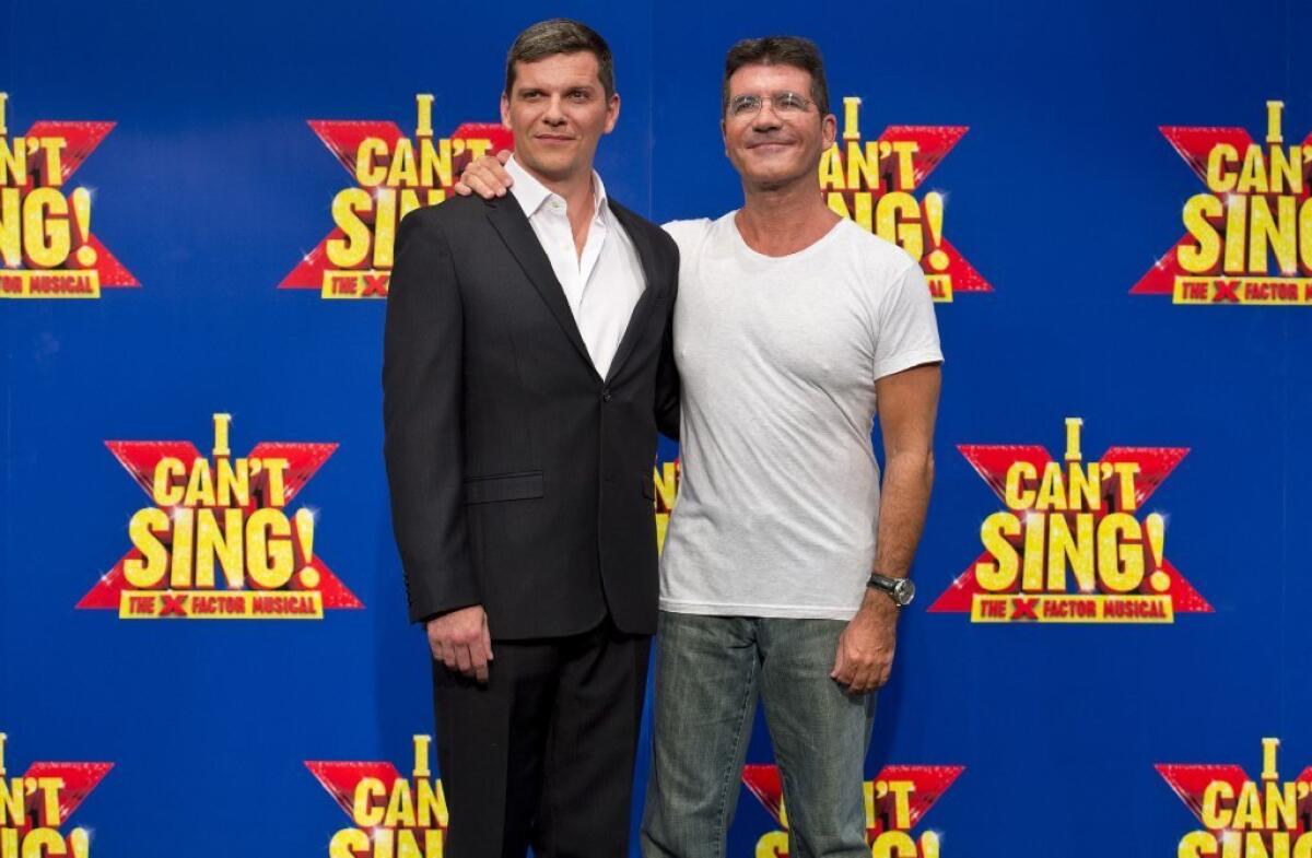 Nigel Harman, left, and Simon Cowell at the London launch of "I Can't Sing! The X Factor Musical"