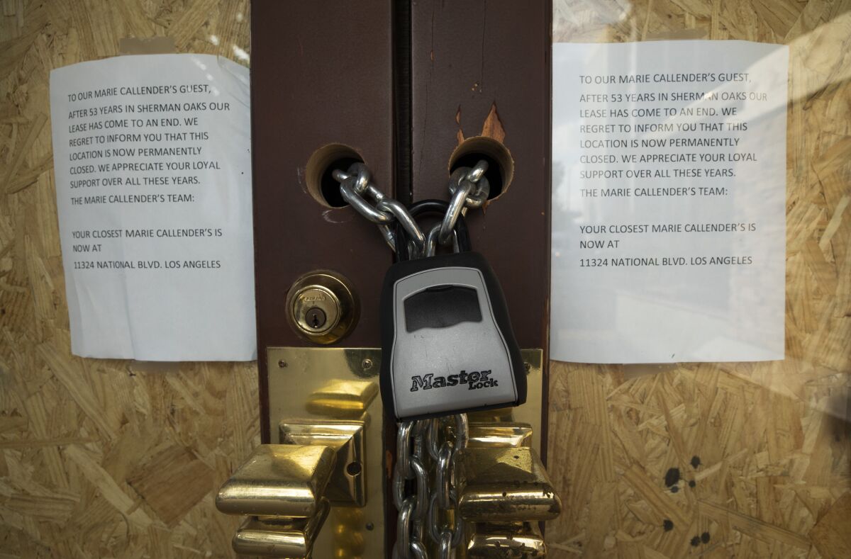 A padlock hangs on the door of the shuttered Marie Callender's on Ventura Boulevard in Sherman Oaks.