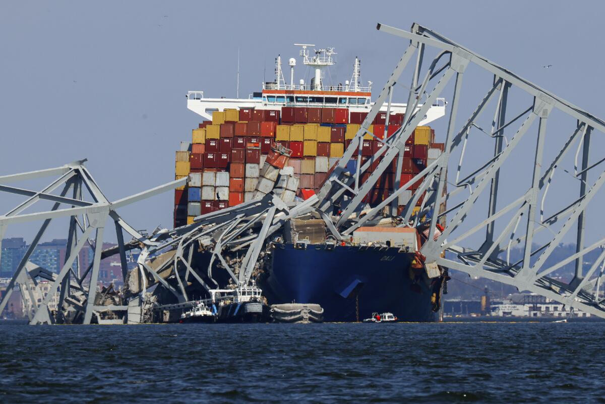 Wreckage of the Francis Scott Key Bridge rests on the container ship Dali in Baltimore, Md.