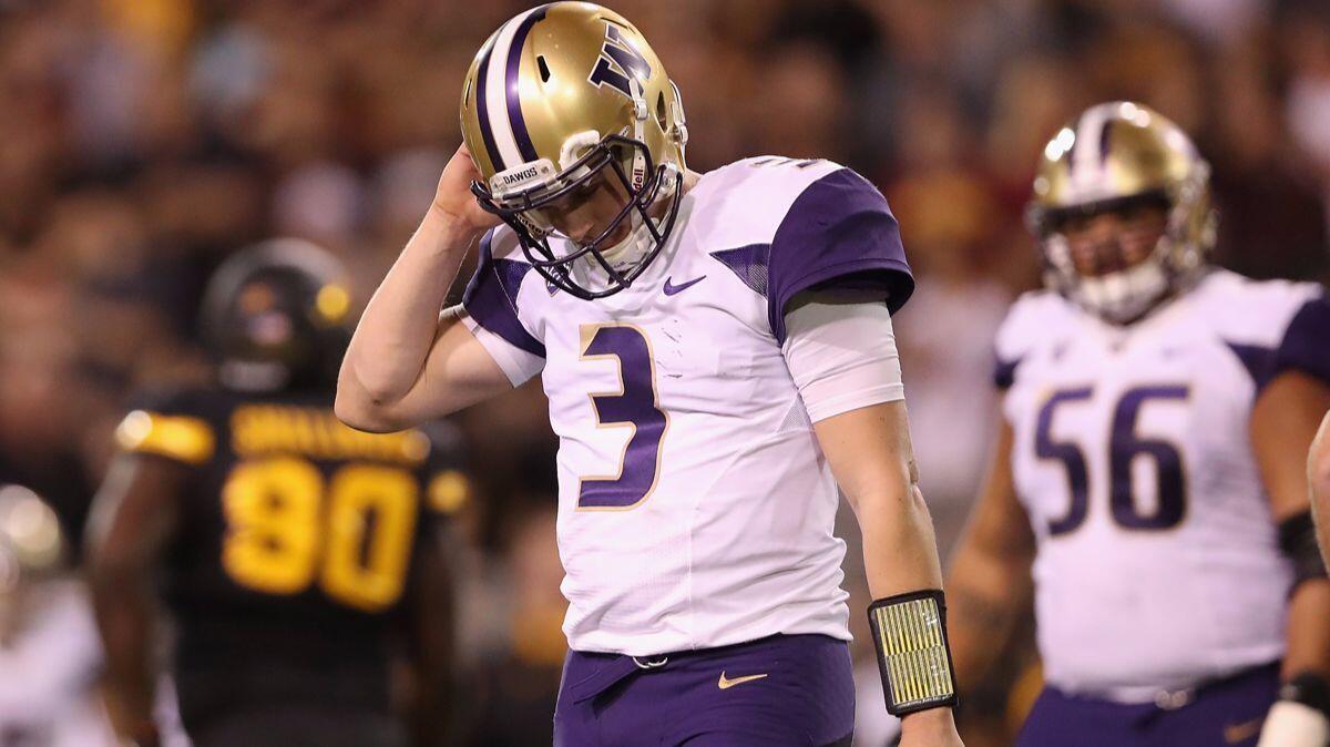 Washington quarterback Jake Browning (3) reacts as he walks off the field during the second half against Arizona State on Saturday. The Sun Devils defeated the Huskies 13-7.