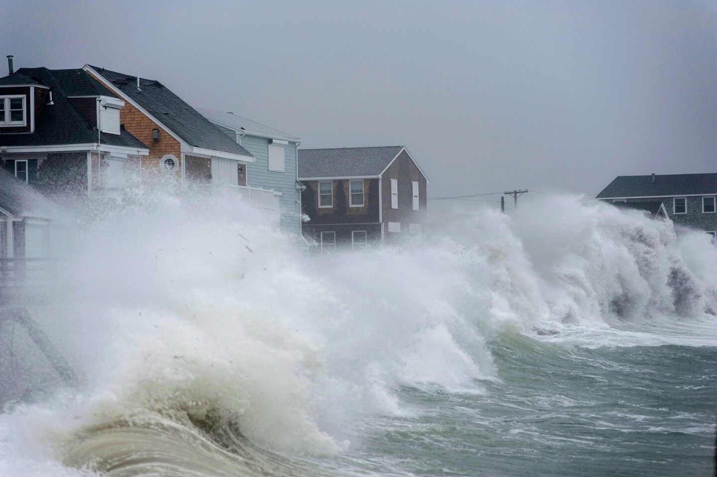 High surf, rain and flooding are taking place in Scituate, Mass., and the surrounding coastal areas of Massachusetts as a storm known as a "bomb cyclone" makes its way past the East Coast.