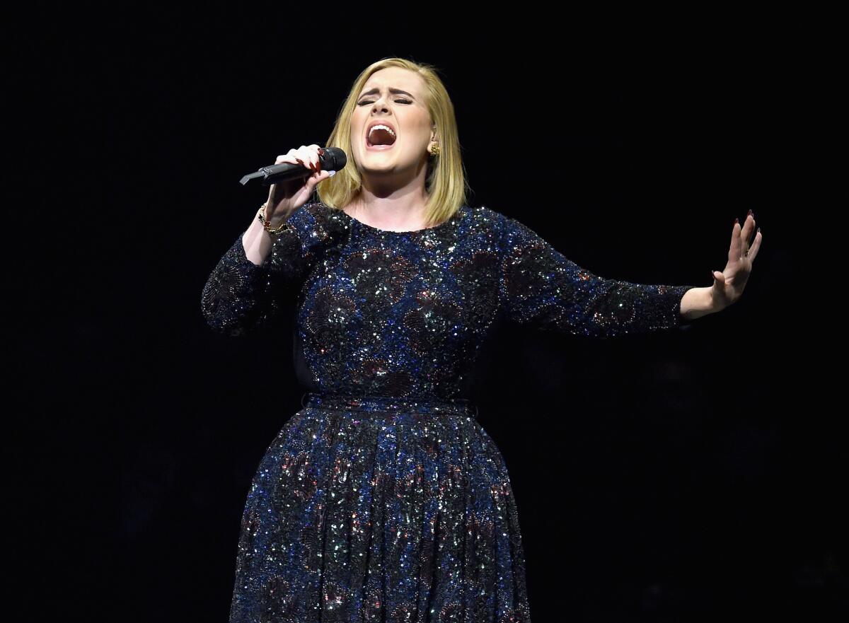 Adele performs Aug. 5 in Los Angeles. The singer missed a concert Wednesday in Phoenix because of a cold. The show has been rescheduled for Nov. 21.