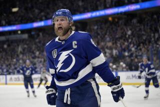 FILE - Tampa Bay Lightning center Steven Stamkos reacts after his goal.