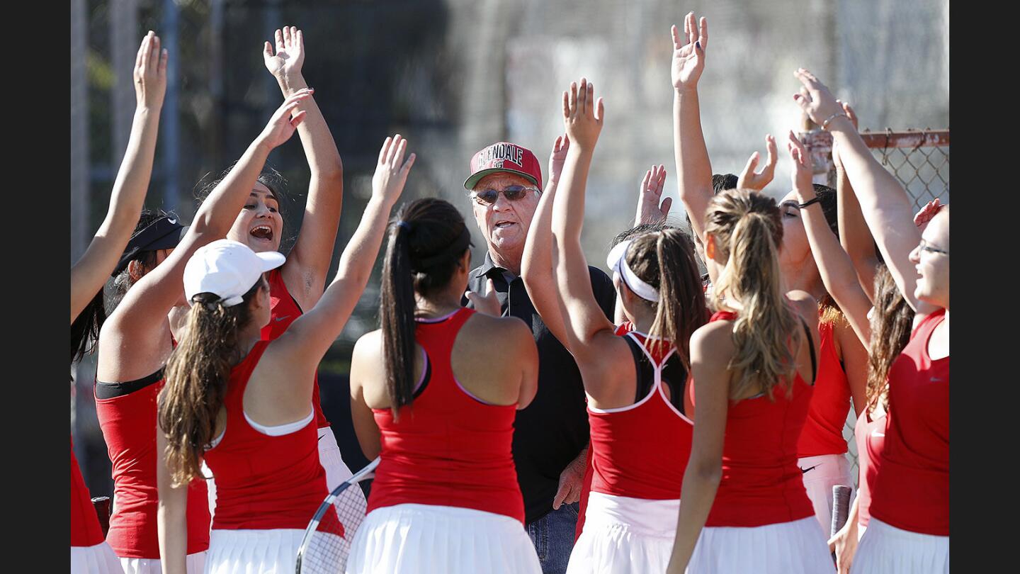 Glendale coach Tom Gossard leads a pre-match cheer before the team plays Rosemead in a CIF Division IV girls' tennis quarterfinals at Glendale High School on Monday, November 6, 2017.