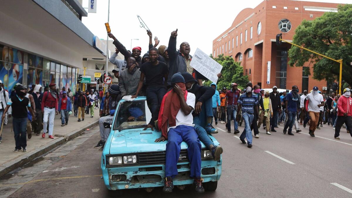 South African protesters shout anti-immigrant slogans during a march in Pretoria on Feb. 24, 2017,