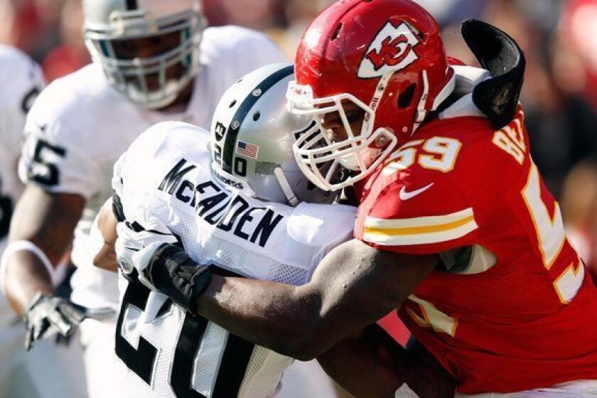 Chiefs linebacker Jovan Belcher tackles running back Darren McFadden of the Oakland Raiders during their game last month at Arrowhead Stadium.