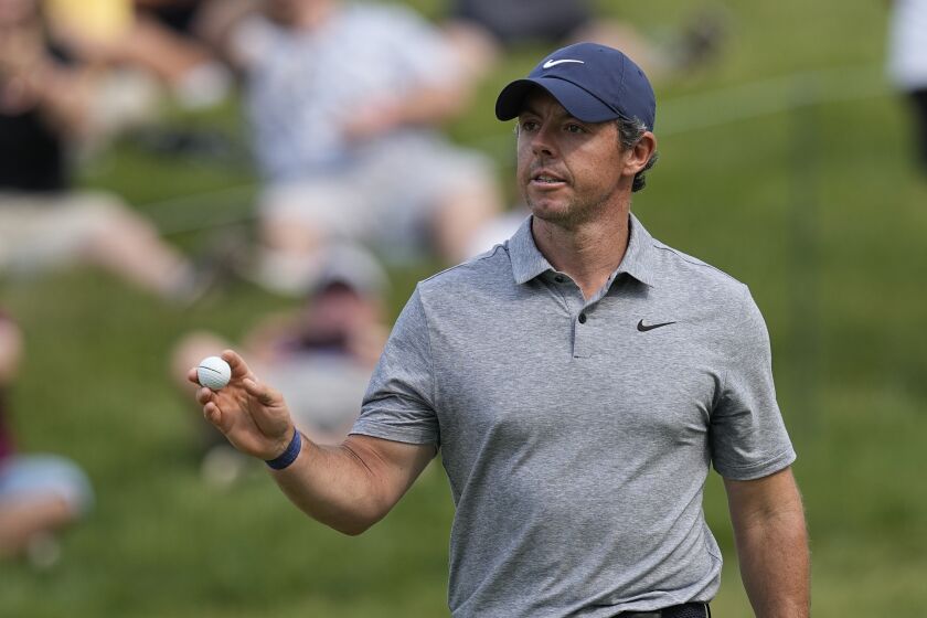 Rory McIlroy, of Northern Ireland, reacts after a birdie on the 17th hole during the third round of the Memorial golf tournament Saturday, June 3, 2023, in Dublin, Ohio. (AP Photo/Darron Cummings)