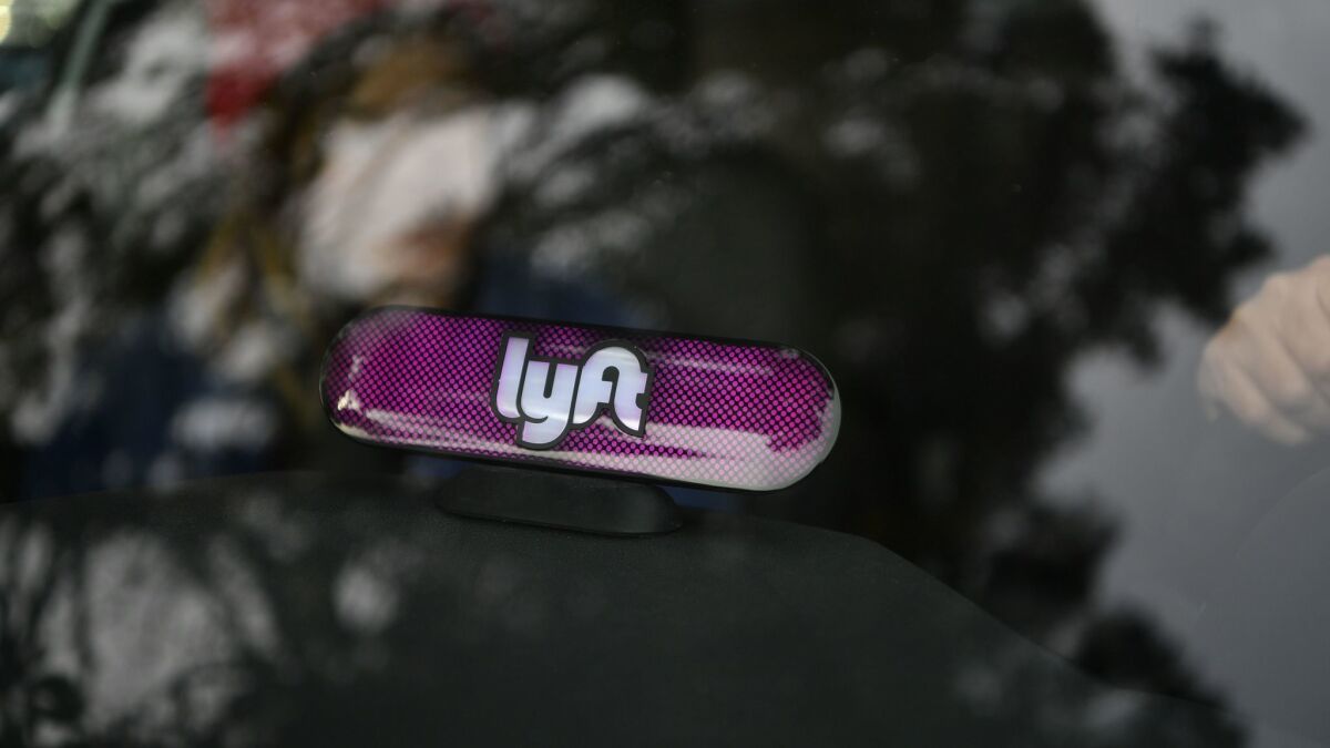 A driver works for Lyft in San Francisco.