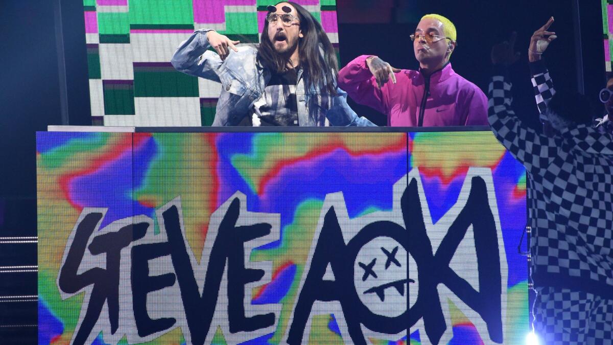 Steve Aoki, left, and J Balvin perform at the 18th annual Latin Grammy Awards at the MGM Grand Garden Arena on Nov. 16, 2017 in Las Vegas.