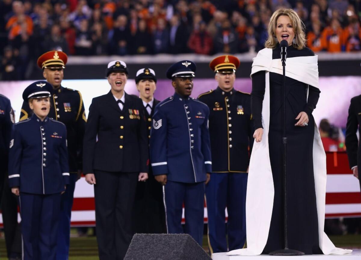 Renée Fleming sings the national anthem during Super Bowl XLVIII at MetLife Stadium in New Jersey.