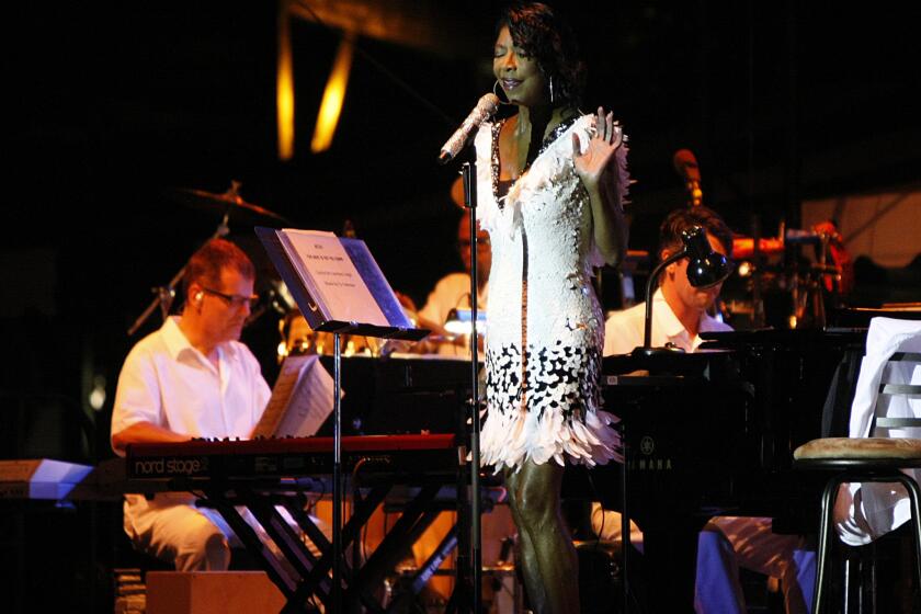 Natalie Cole, shown performing at last summer's Newport Jazz Festival, is among this year's Latin Grammy award nominees for her first Spanish-language album.