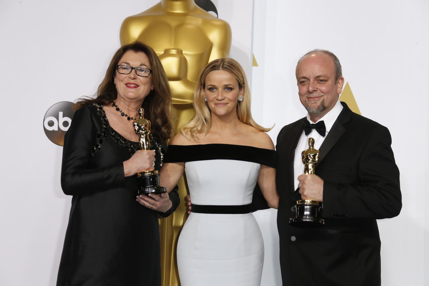 Oscars 2015 winners' room | Frances Hannon and Mark Coulier with presenter Reese Witherspoon
