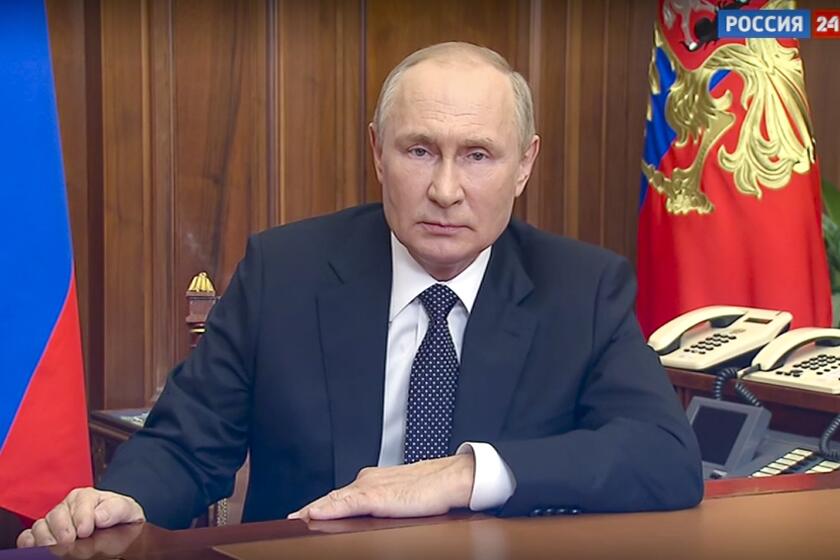 In this image made from a video released by the Russian Presidential Press Service, Russian President Vladimir Putin addresses the nation in Moscow, Russia, Wednesday, Sept. 21, 2022. (Russian Presidential Press Service via AP)