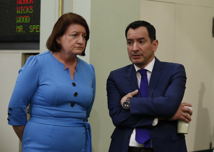 Toni Atkins and Anthony Rendon stand next to each other