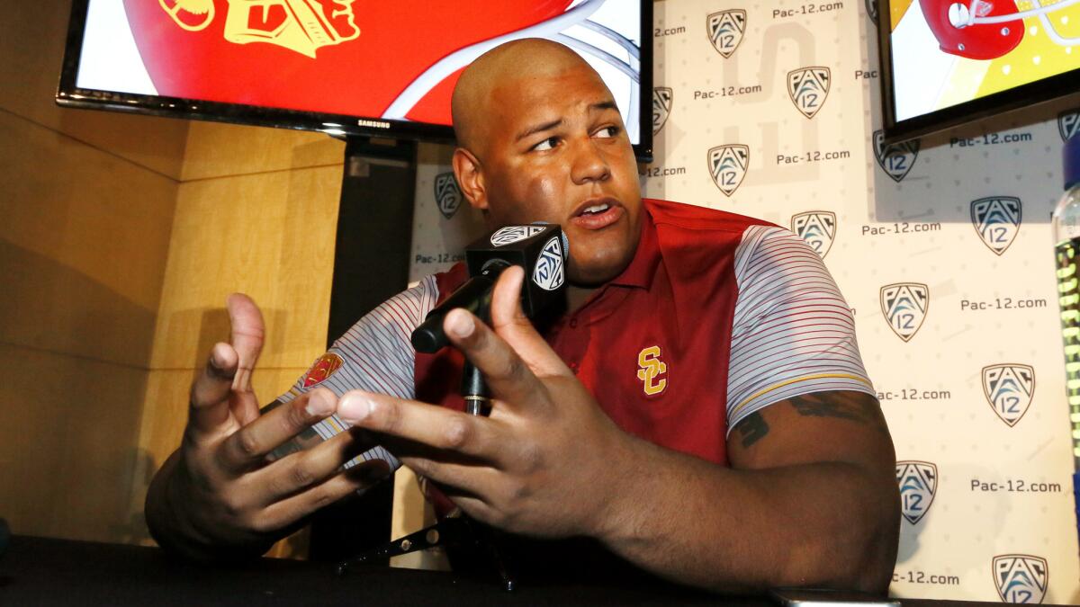 USC offensive tackle Zach Banner speaks last month during Pac-12 media days.