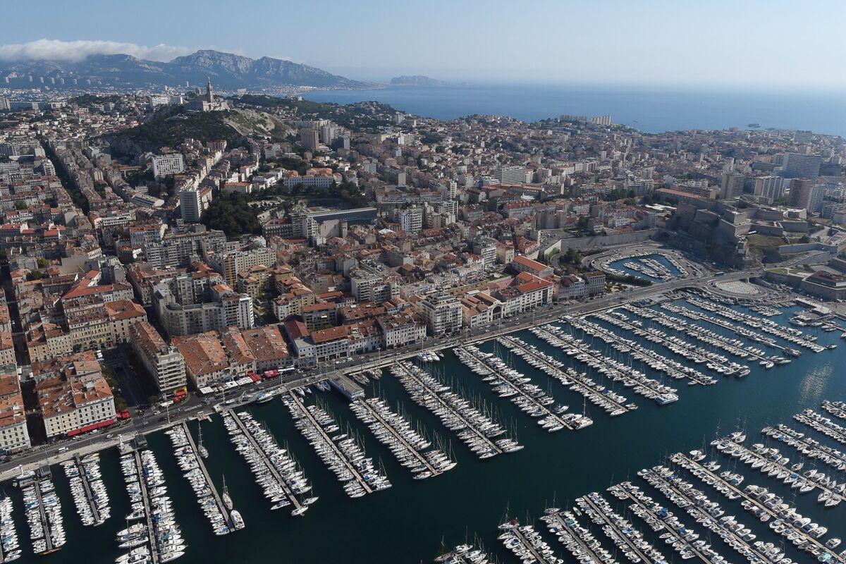 This photo taken on June 30, 2015 shows an aerial view of the Old Port of Marseille, southern France. (Boris Horvat, Pool image via AP)