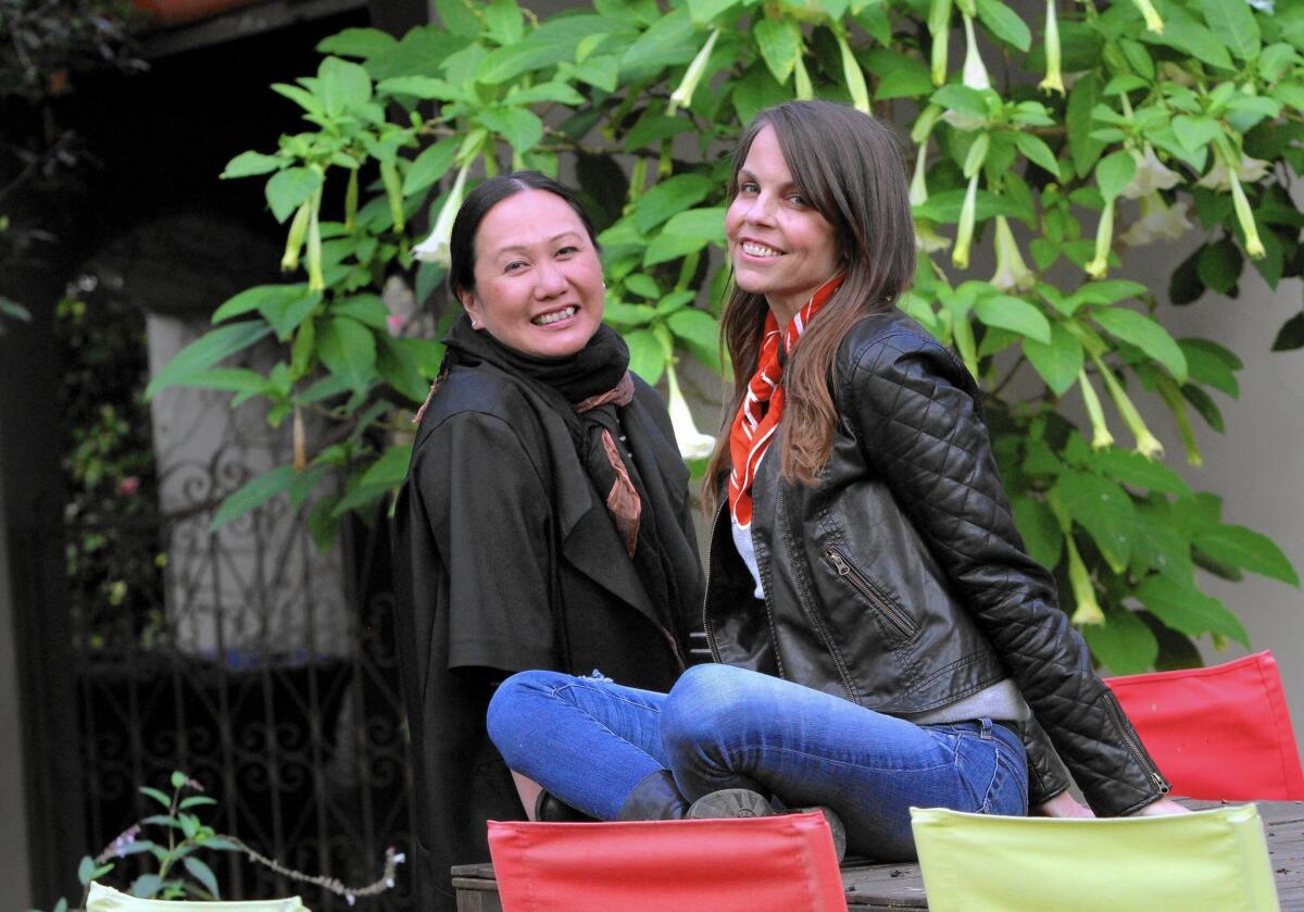 Authors Melissa de la Cruz, left, and Margaret Stohl at Stohl's Santa Monica home.