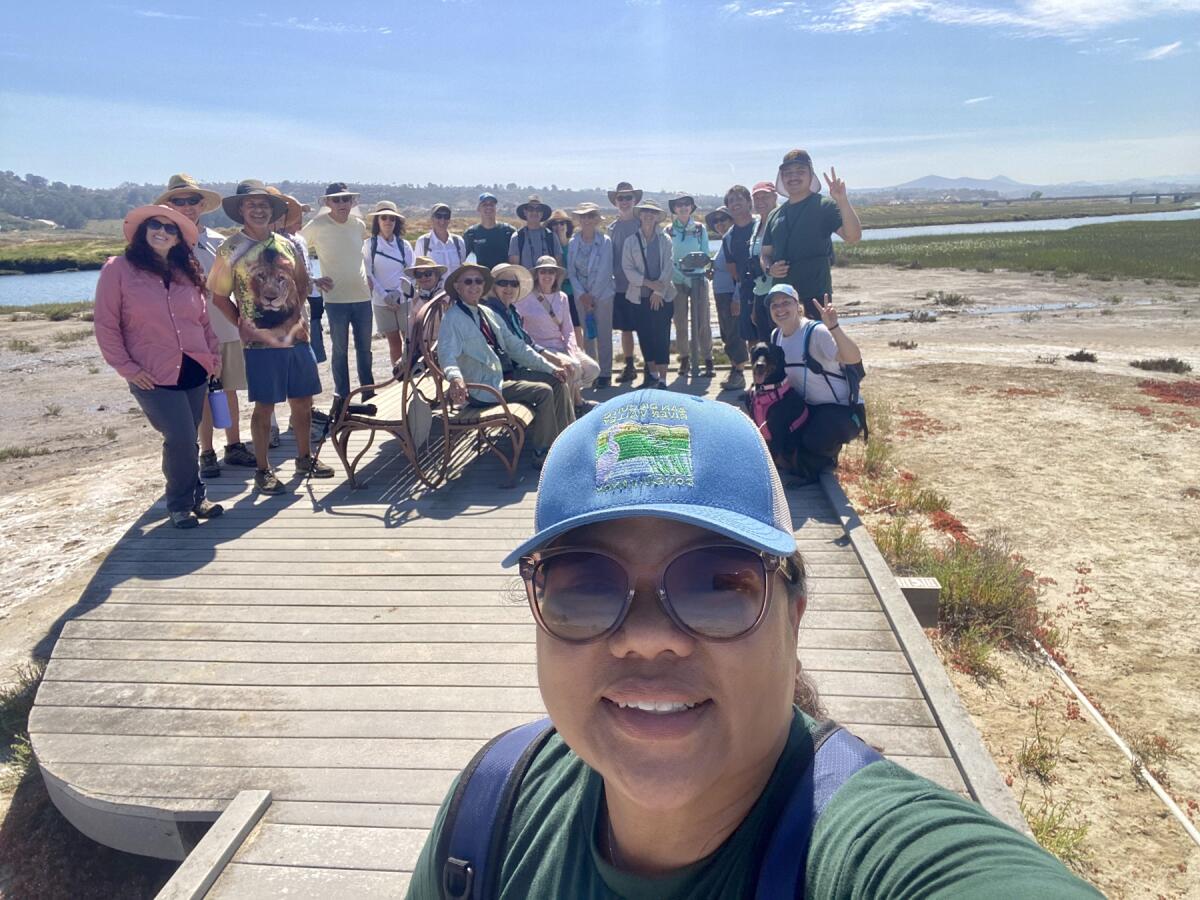 Cheryl Goddard, San Dieguito River Valley Conservancy’s executive director, taking a selfie with “Walk ’n Talk” participants.