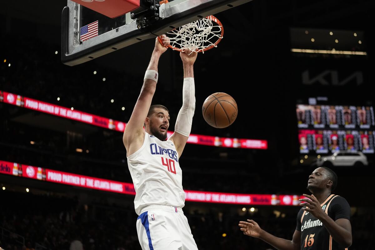 Clippers center Ivica Zubac dunks against the Atlanta Hawks in the first half Saturday.
