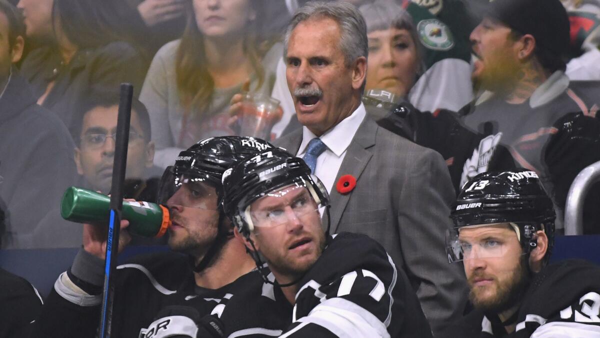 Kings coach Willie Desjardins, above, says much of the team's success stems from goaltending coaches Bill Ranford and Dusty Imoo