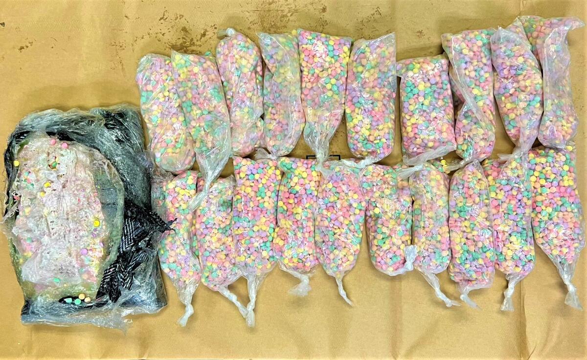 Officers Tuesday retrieved bags of fentanyl thrown from a vehicle during a police pursuit from Costa Mesa to Newport Beach.