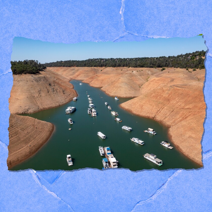 Brown banks extend high above a narrow body of water.