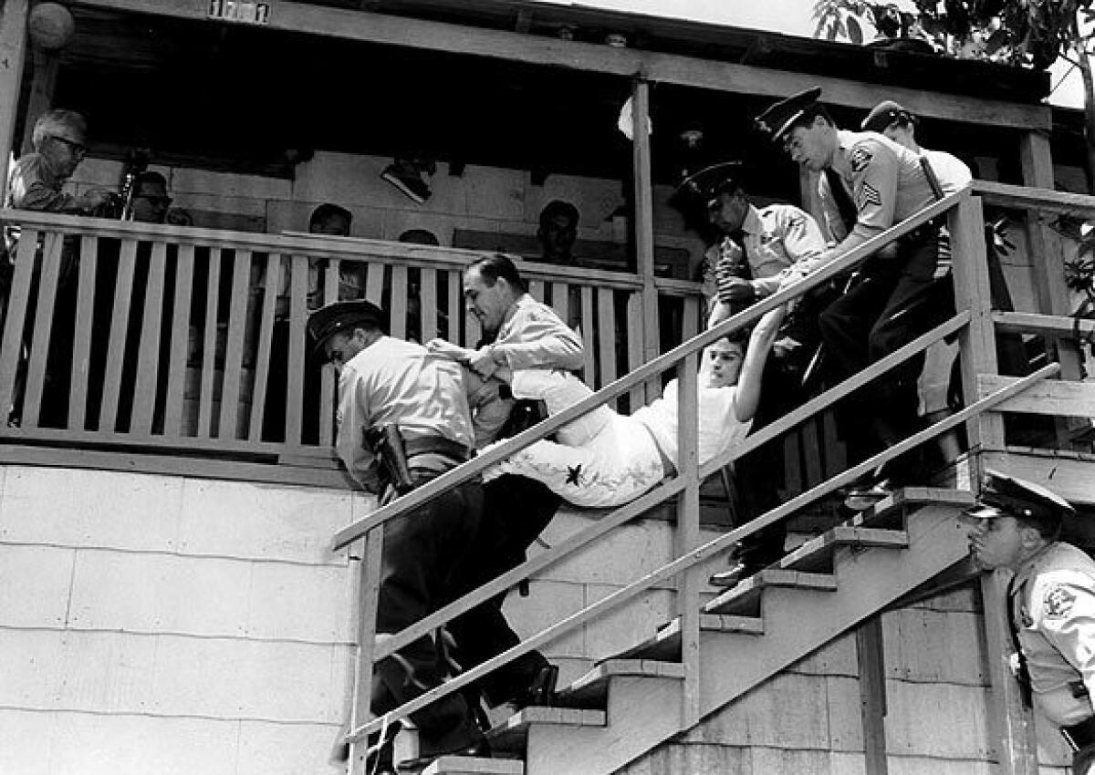 A family is evicted from their Chavez Ravine home on May 8, 1959, in advance of Dodger Stadium construction.