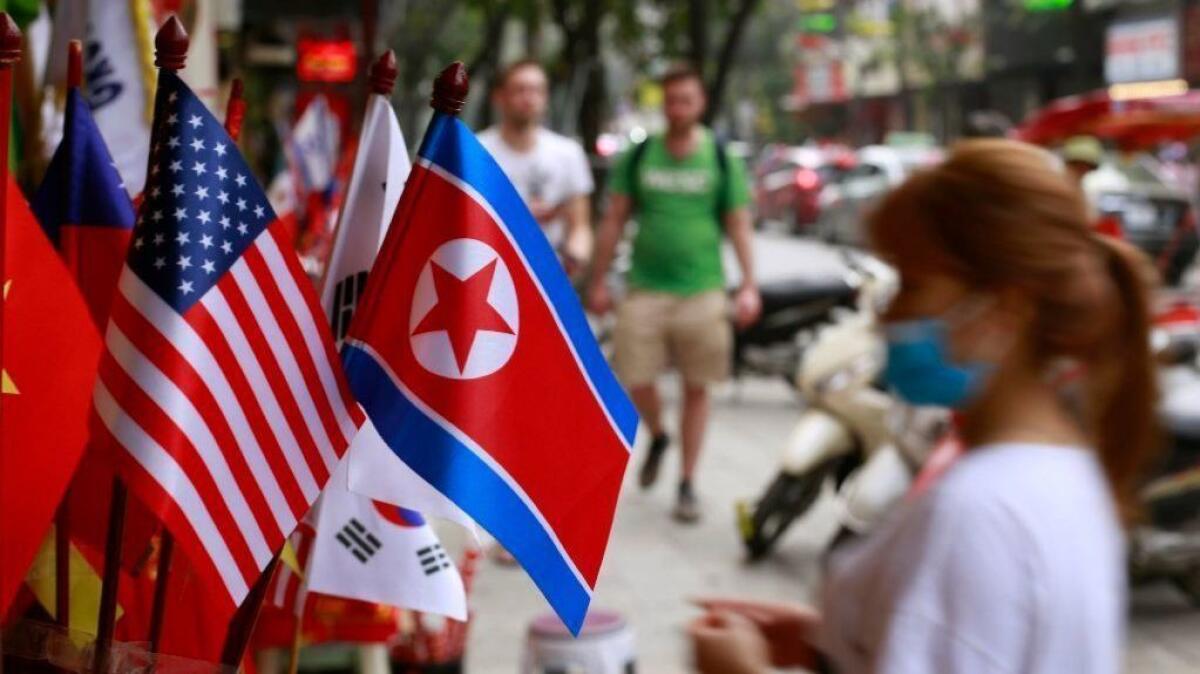 U.S. and North Korean flags on display for sale at a flag shop in Hanoi, Vietnam.