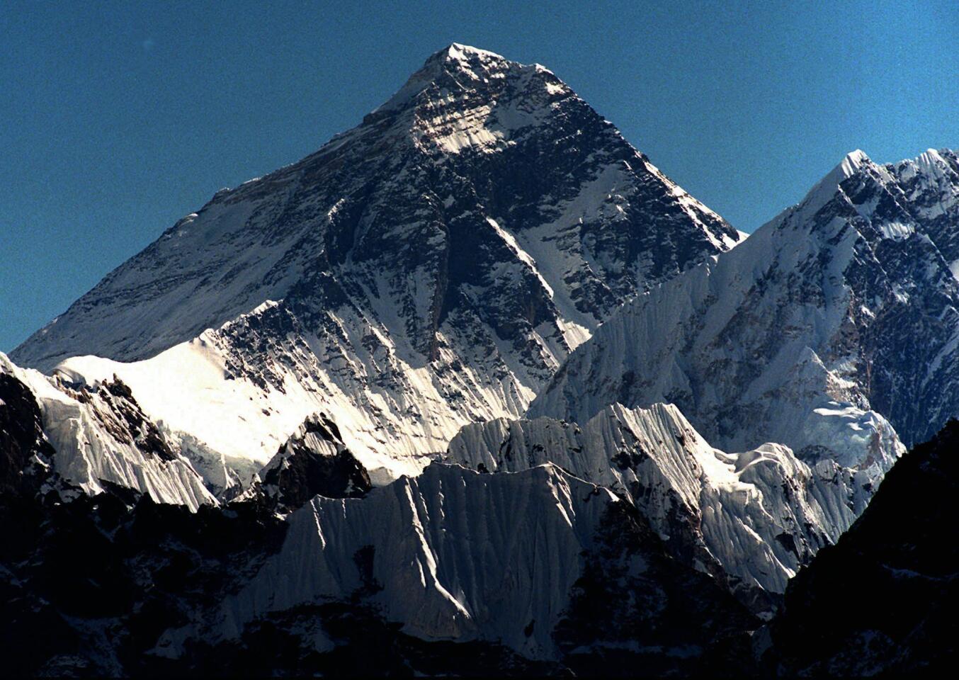 Mount Everest is seen from peak Gokyo Ri in Nepal in 1996.