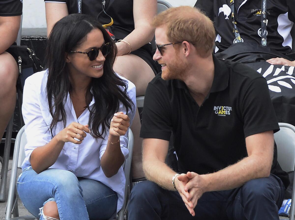 Prince Harry and his girlfriend, Meghan Markle, attend a wheelchair tennis event at the Invictus Games in Toronto on Monday.