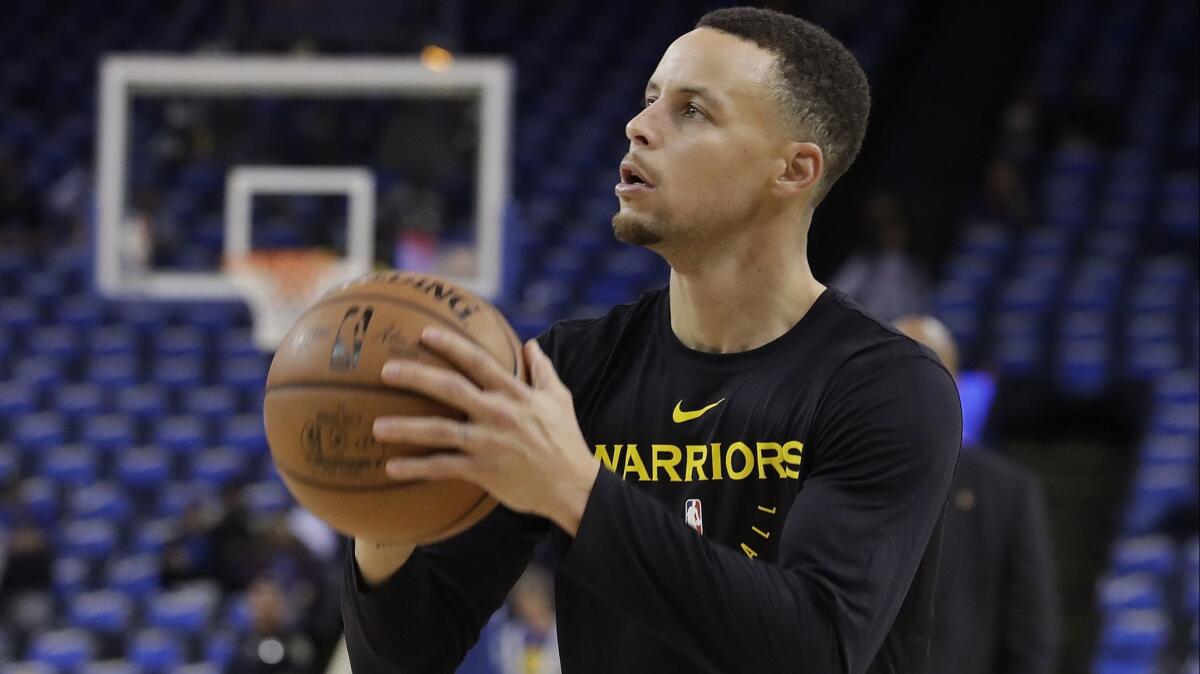 Warriors guard Stephen Curry works out before a game Wednesday.