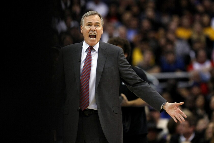 Lakers Coach Mike D'Antoni yells out instructions to his team during the Lakers' 123-87 loss to the Clippers on Jan. 10.