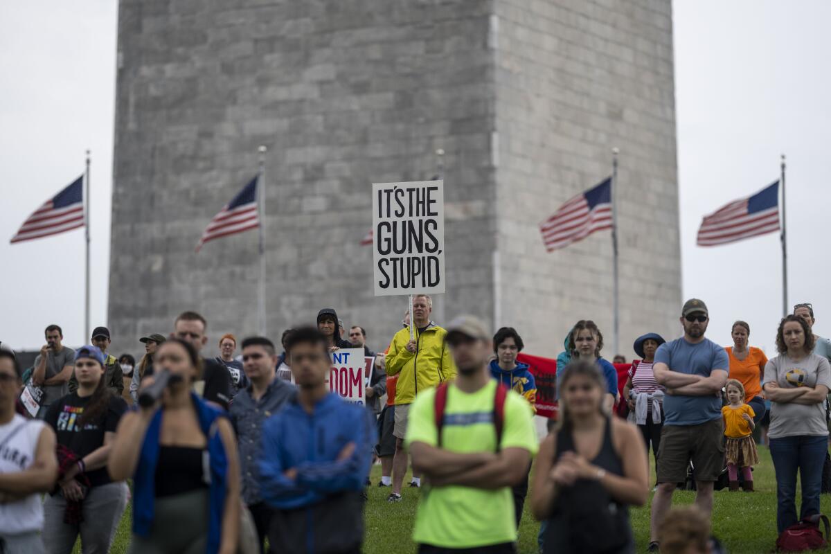 Demonstrators gather on the National Mall near the Washington Monument for Saturday's March for Our Lives rally