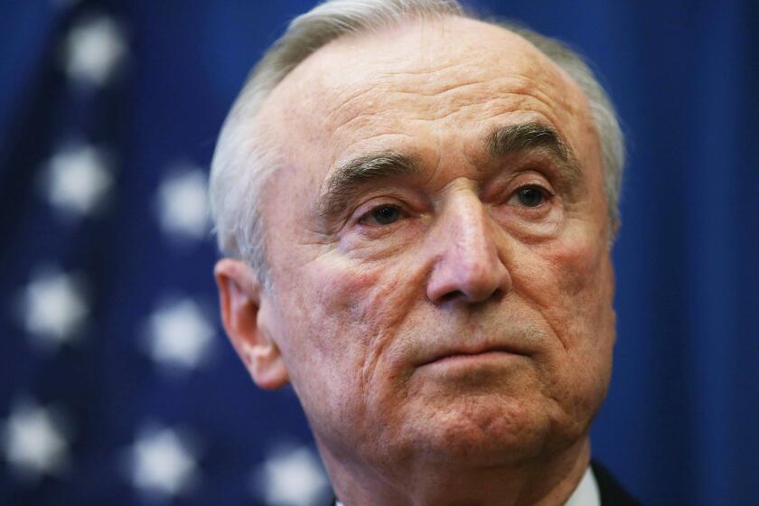 Bill Bratton, who has been named to lead the New York Police Department, pauses after being introduced by New York City Mayor-elect Bill de Blasio in New York City.