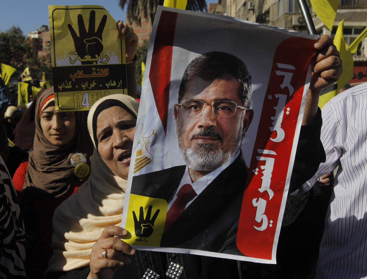 Supporters of Egypt's ousted Islamist president Mohamed Morsi rally in Cairo this month.